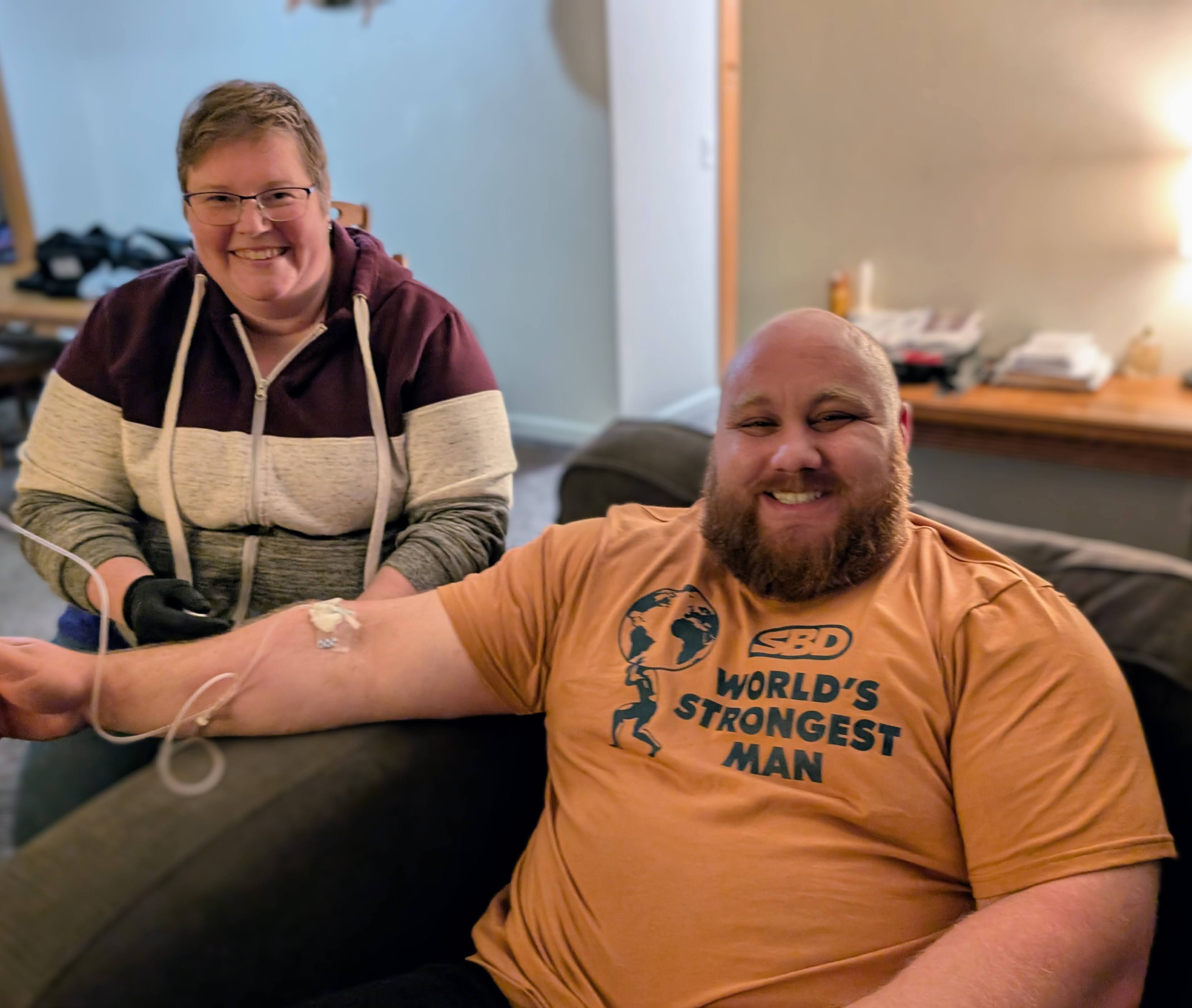 Amanda administering an IV to Lucas Hatton, 2025 World's Strongest Man competitor